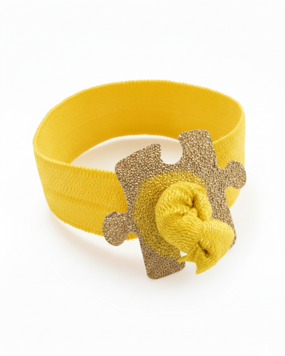 Autism Awareness Elastic Ribbon with a Gold Plated Puzzle Charm