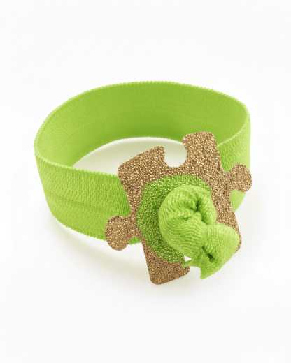 Autism Awareness Elastic Ribbon with a Gold Plated Puzzle Charm