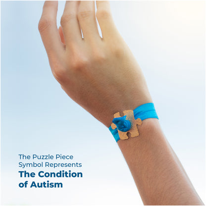 Autism Awareness Elastic Ribbon with a Gold Plated Puzzle Charm