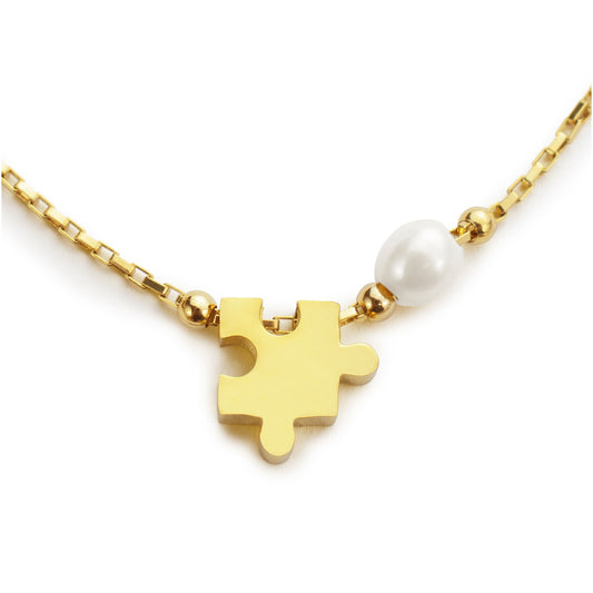 Empathy Pearl Autism Awareness Necklace with Delicate Puzzle Charm. Connected with Austim Community.